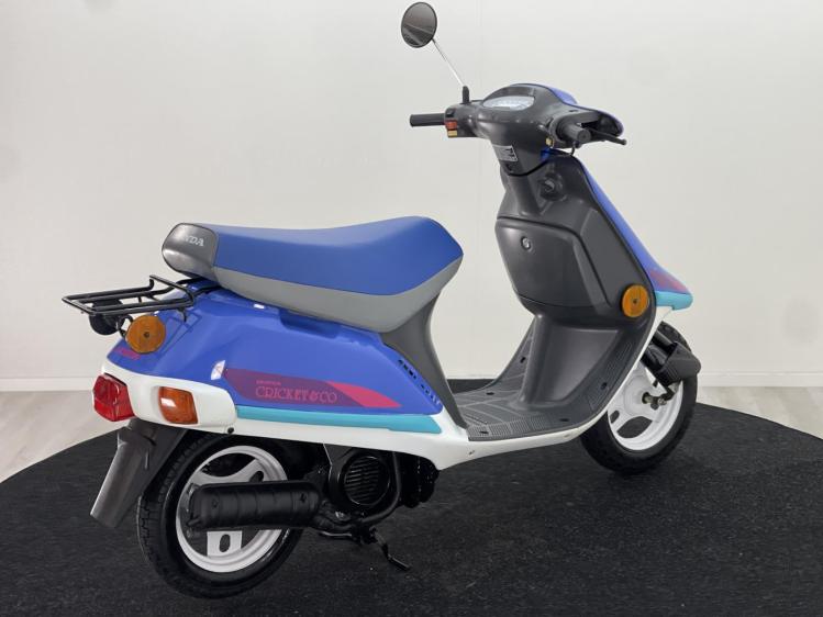 Honda Vision Met-in 50 Cricket & Co blauw